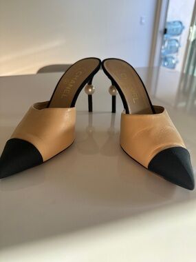 CHANEL Beige Leather Mules with Black Cap Toes and Pearl Stiletto Heels
